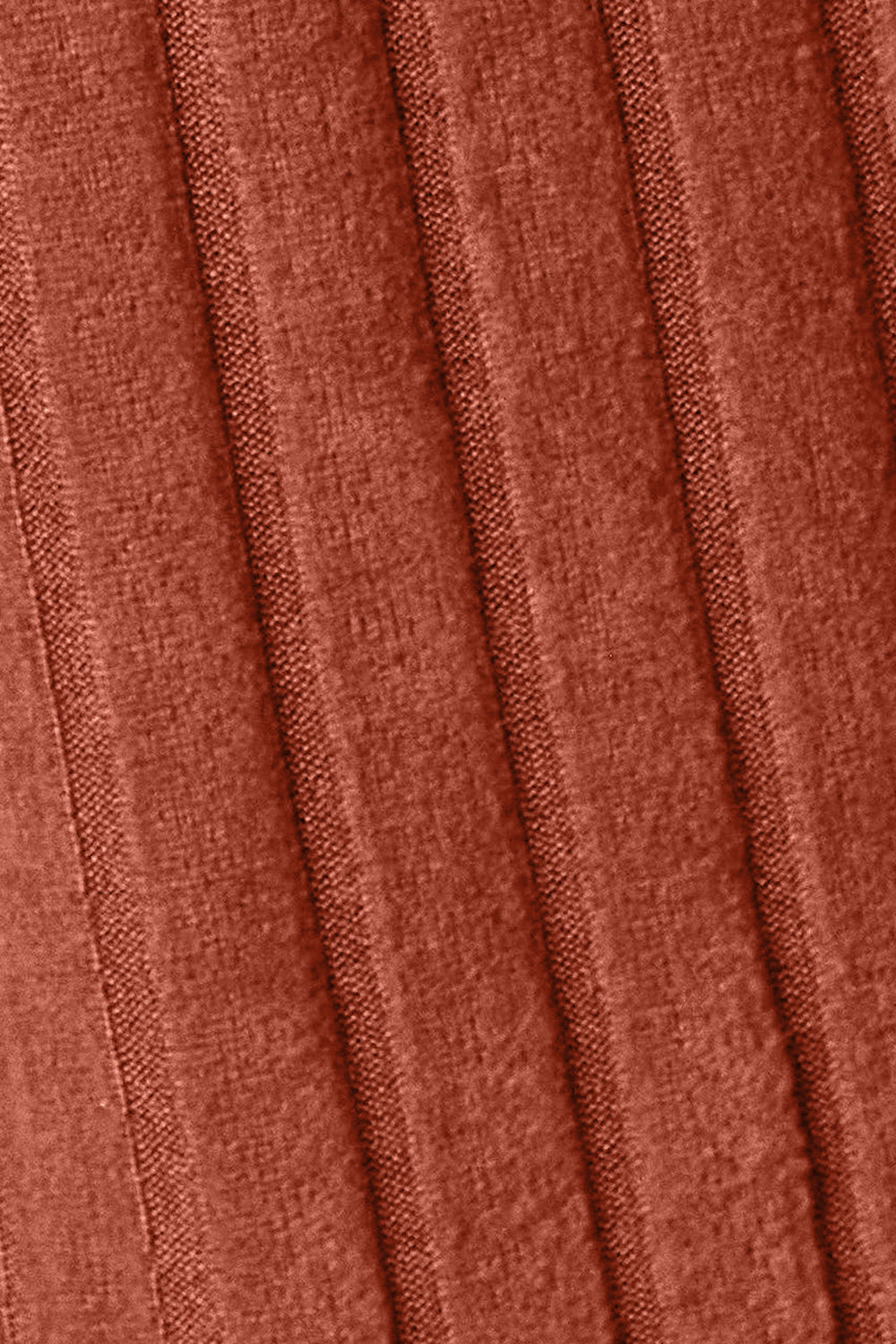 A close-up of the Basic Bae Full Size Hooded Sweater Cardigan showcases its textured fabric with a pleated pattern in a warm, reddish-brown shade. The vertical folds add depth to this pocketed sheer cardigan, giving it an elegant and soft look that is ideal for machine wash cold care.