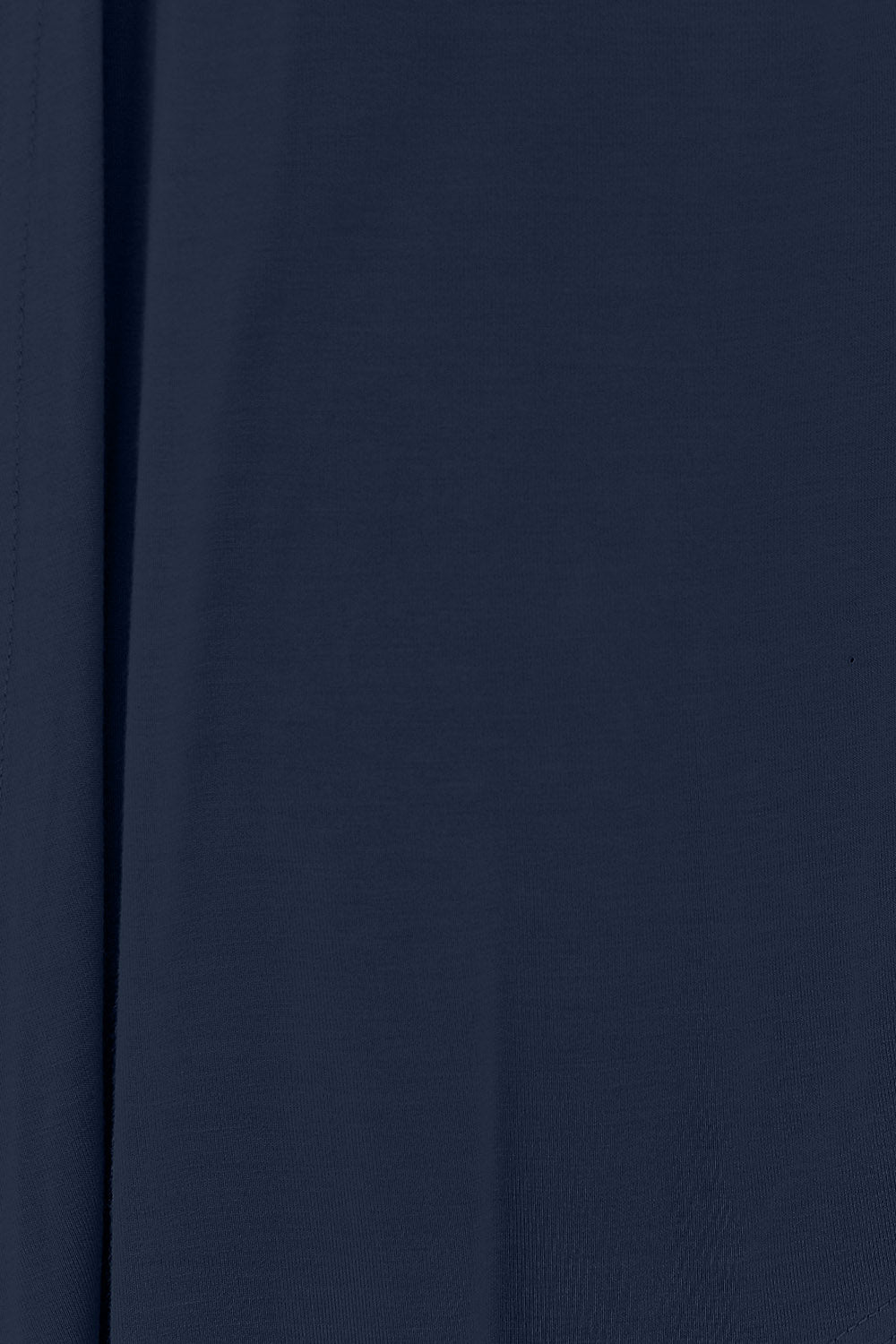 A close-up view of the Basic Bae Full Size Open Front Long Sleeve Cardigan in dark blue rayon spandex fabric reveals a slightly textured surface with vertical folds and shadows, highlighting its basic style and slightly stretchy draping.