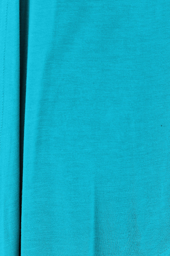 A close-up of the turquoise fabric from the Basic Bae Full Size Open Front Long Sleeve Cardigan, crafted from rayon spandex, showcases its texture and weave.