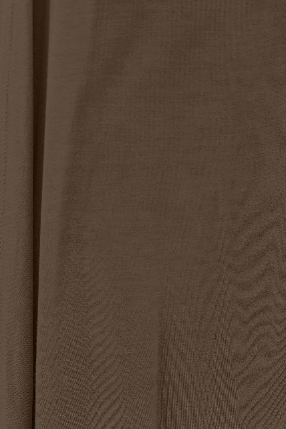 Close-up of the brown fabric from the Basic Bae Full Size Open Front Long Sleeve Cardigan, featuring a soft and smooth texture made from rayon spandex. The image shows a vertical seam on the left, highlighting subtle shadows and natural folds in its slightly stretchy material.