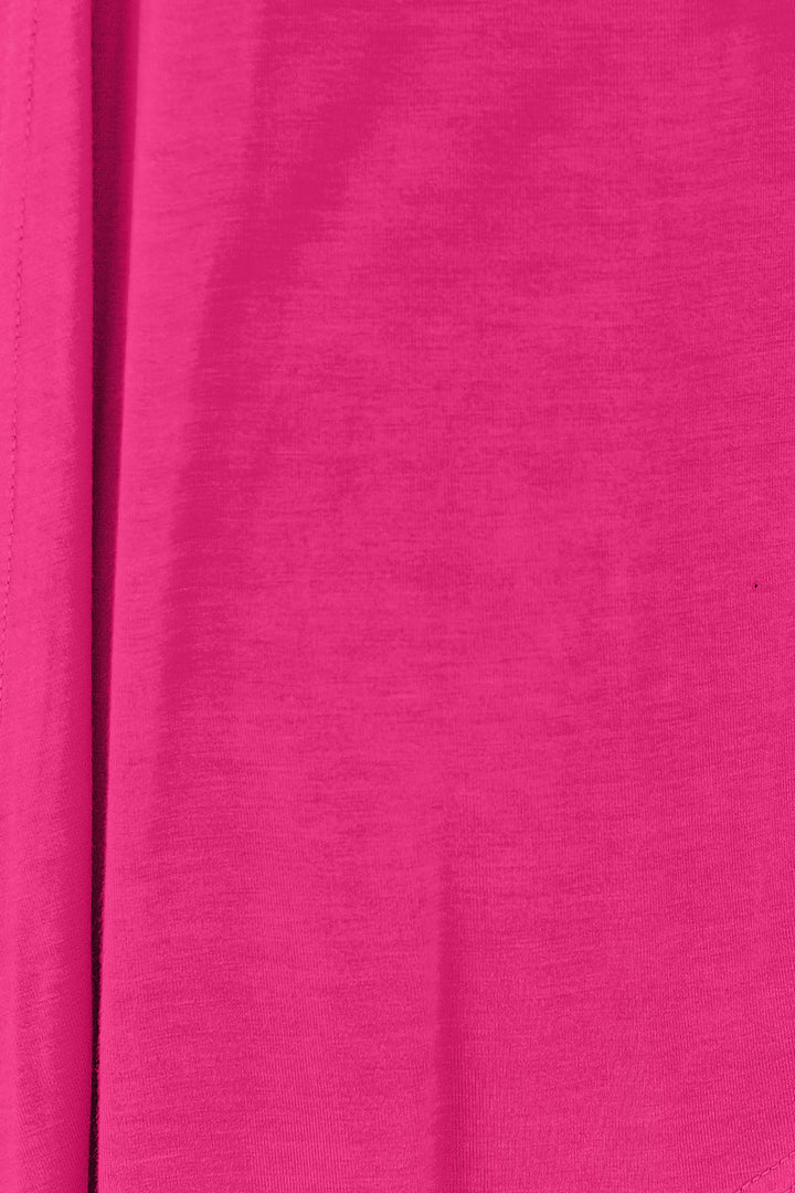 Close-up of the Basic Bae Full Size Open Front Long Sleeve Cardigan, showcasing its slightly stretchy rayon spandex fabric in a vibrant pink color with a subtle texture. The image reveals fold lines and a smooth, basic style surface.