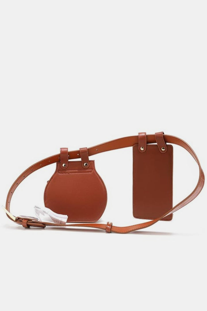 The Nicole Lee USA 2 Piece Texture Belt Bag features brown vegan leather, two attached pouches (round and rectangular), a gold buckle, adjustable strap, and is shown against a plain white background.