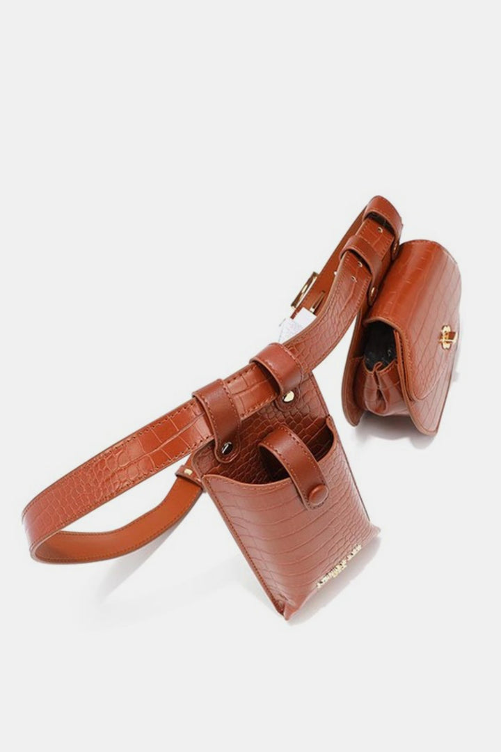 The Nicole Lee USA 2 Piece Texture Belt Bag features brown vegan leather, crocodile texture, gold-tone hardware, two attached pouches—one rectangular and one rounded—and an adjustable strap, displayed against a white background.