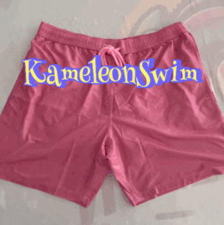 A pair of pink Color Changing Mens Swim Trunks with a drawstring is displayed on a flat surface. These quick-drying trunks are ideal for dynamic adventures. The text KameleonSwim appears on the image in a stylized font.
